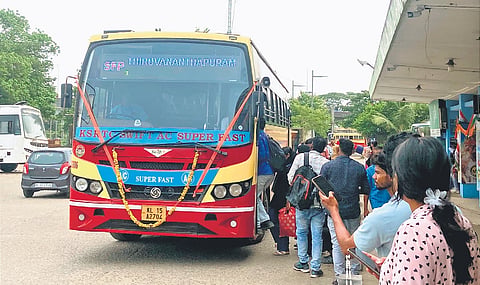 Passengers boarding a superfast AC bus at the Ernakulam KSRTC bus station