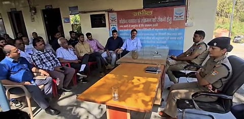 Dehradun SSP Ajay Singh in a meeting with hostel owners and college representatives of the area where students from Jammu and Kashmir reside.