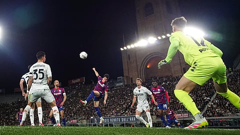 Bologna's Giovanni Fabbian, centre left, scores their side's first goal of the game during the semi-final second leg Frecciarossa Italian Cup soccer match between Bologna and Empoli on Thursday April 24, 2025