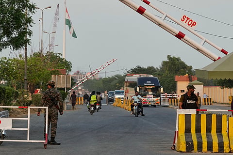Pakistan's paramilitary soldiers stand guard at a checkpoint near Wagah, a joint border crossing point between the Pakistan and India border, Thursday, April 24, 2025.