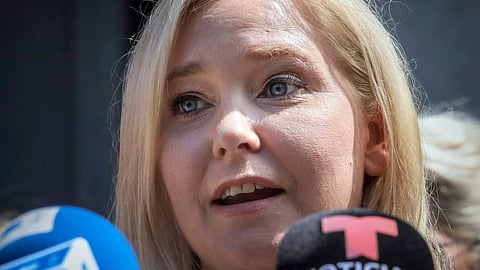Virginia Giuffre speaks during a news conference outside a Manhattan court in New York, Aug. 27, 2019.