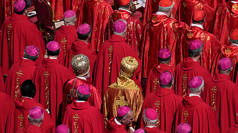 Cardinals stand during the funeral of Pope Francis in St. Peter's Square at the Vatican, Saturday, April 26, 2025.
