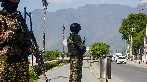 Security personnel keep a vigil on the banks of Dal Lake, in the aftermath of the Pahalgam terrorist attack, in Srinagar, Jammu and Kashmir, Sunday, April 27, 2025.