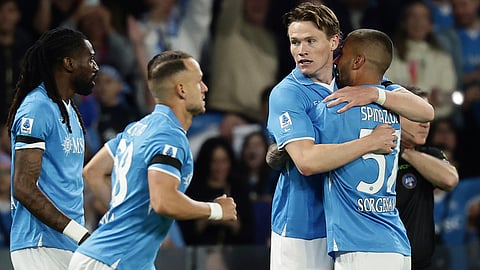 Napoli's Scott McTominay, second right, celebrates after scoring the opening goal during the Serie A soccer match between Napoli and Torino FC in Naples, Italy, Sunday, April 27, 2025.