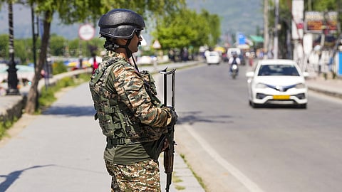 A security personnel keeps vigil, in the aftermath of the Pahalgam terrorist attack, in Srinagar, Monday