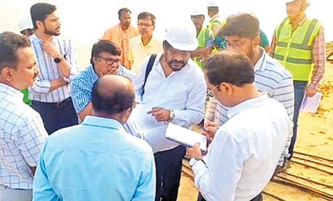 The state-level probe panel going through official documents at the mishap site