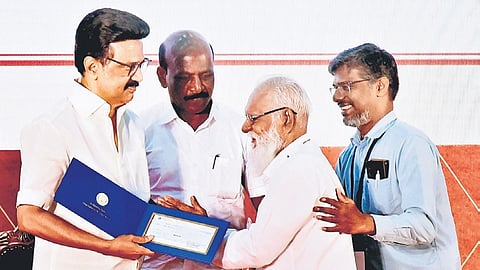 CM M K Stalin presenting the royalty amount to the heirs of the deceased writers
