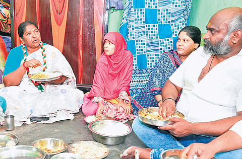 Panchayat Raj & Rural Development Minister Dansari Anasuya at the residence
of fine rice scheme beneficiary in Begumpet, Hyderabad on Tuesday