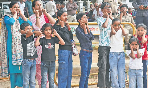 Children take part in a mock drill in Ulsoor on Wednesday