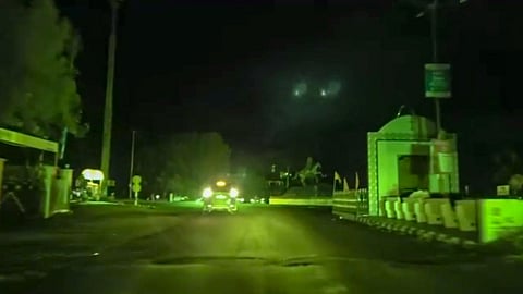 A vehicle moves on a road during blackout amid escalating tensions between India and Pakistan, in Kutch district, Gujarat, Thursday, May 8, 2025.