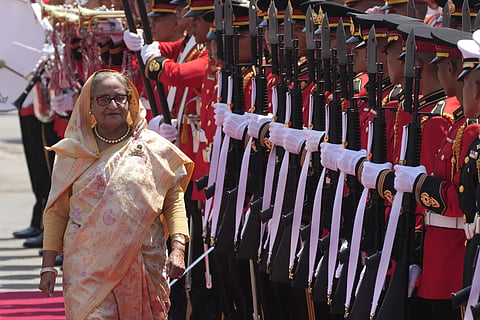 Bangladesh's Prime Minister Sheikh Hasina reviews an honour guard during a welcome ceremony at the government house in Bangkok, Thailand, Friday, April 26, 2024.