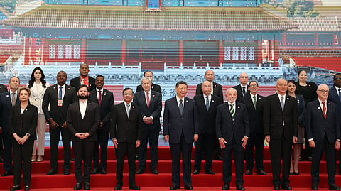 Chinese President Xi Jinping (C), Brazil President Luiz Inacio Lula da Silva (front 3rd R), Chile President Gabriel Boric (front 2nd L), Colombia President Gustavo Petro (front 3rd L) and other CELAC representatives attend a group photo session before the opening ceremony of the Fourth Ministerial Meeting of the Forum of China and Community of Latin American and Caribbean States (CELAC) in Beijing on May 13, 2025.