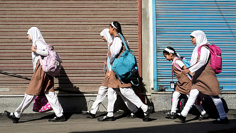 Students head to school as educational institutions reopen in non-border districts after remaining closed for nearly a week due to India-Pakistan tensions in Srinagar.