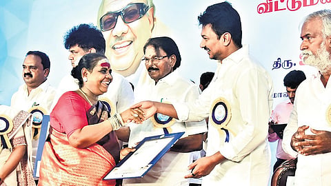 Deputy CM Udayanidhi Stalin giving away the pattas at Tiruvottiyur.