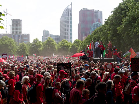 Demonstrators gather on the Malieveld for the Red Line protest in The Hague, Netherlands on Sunday, May 18, 2025.