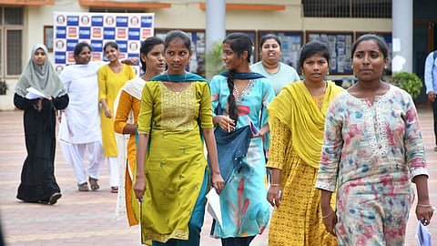 Students coming out of an exam centre after taking EAPCET examination in Vijayawada.
