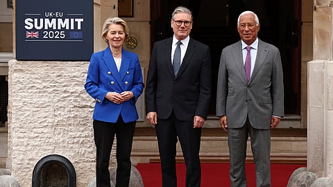 Britain's Prime Minister Keir Starmer, center, stands for a photo with European Commission President Ursula von der Leyen and European Council President Antonio Costa, right, ahead of a United Kingdom and European Union summit at Lancaster House, London, Monday, May 19, 2025.