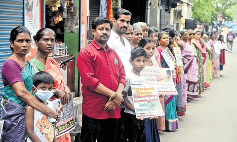 Federation of North Chennai Residents Welfare Association, along with civic groups and councillors, organised a human chain protest on Sunday