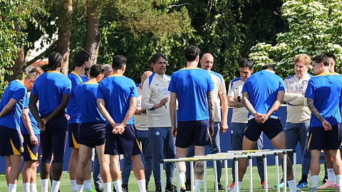 Inter Milan players gather with their head coach, Simone Inzaghi, during a training session of the Champions League Media Day in view of Saturday's Champions League final against PSG, at the Inter Milan training center in Appiano Gentile, Italy, Monday, May 26, 2025.