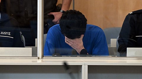 Issa Al H., accused of stabbing three people to death during a city festival, sits in the courtroom of the Higher Regional Court in Duesseldorf, Germany, Tuesday, May 27, 2025.