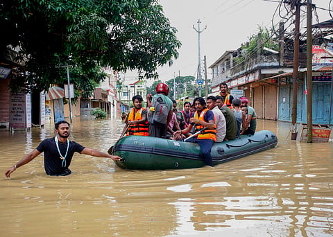 Flood-affected villagers are moved to a safer place after heavy rains at Baldakhal village on the outskirts of Agartala, Sunday, June 1, 2025.
