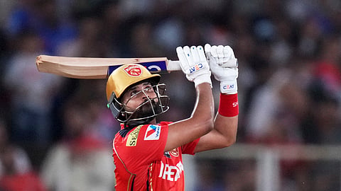 Punjab Kings' captain Shreyas Iyer plays a shot during the Indian Premier League cricket match between Punjab Kings and Mumbai Indians at Narendra Modi Stadium in Ahmedabad, India, Monday, June 2, 2025.