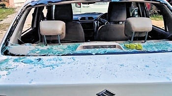 The damaged car of the officer.