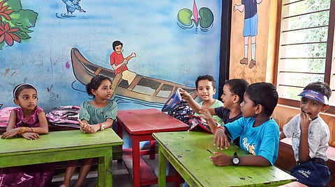 Laughs fill the classroom as lessons commence in Kerala schools