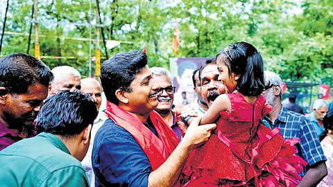 Cheery moments unfold as LDF candidate M Swaraj and his UDF counterpart Aryadan Shoukath interact with voters at Pothukal panchayat