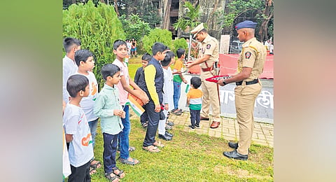 Pune deputy police commissioner
Sandeep Bhajibhakare engages with children at his village in the Solapur district of Maharashtra.