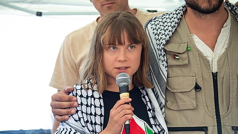 Climate activist Greta Thunberg with other activists from a human rights organization meets with journalists in Catania, Italy, Sunday, June 1, 2025, ahead of their departure for the Mideast.