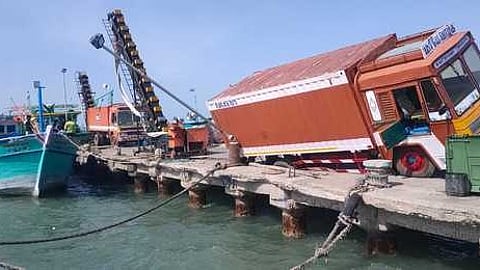The container truck stuck in the jetty at Tharuvaikulam fishing harbour in Thoothukudi district.