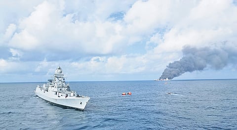Smoke billows out of Wan Hai 503 after a massive fire broke out on board following an explosion in one of the containers. The Navy diverted INS Surat, which had been scheduled to dock in Kochi, to provide immediate assistance