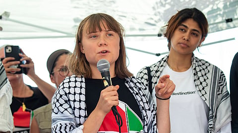 Climate activist Greta Thunberg with other activists from a human rights organization meets with journalists.