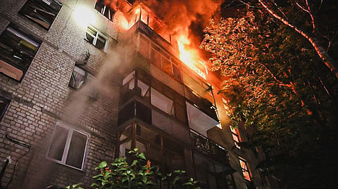 In this photo provided by the Ukrainian Emergency Service, a view after a Russian attack that hit a residential building in Kharkiv, Ukraine, Wednesday, June 11, 2025