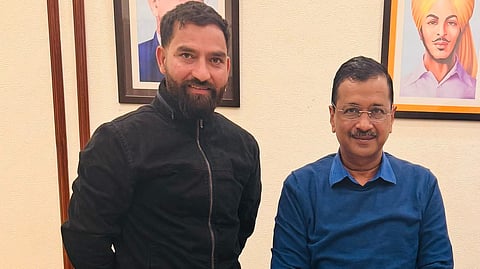 AAP MLA Mehraj Malik with Arvind Kejriwal.