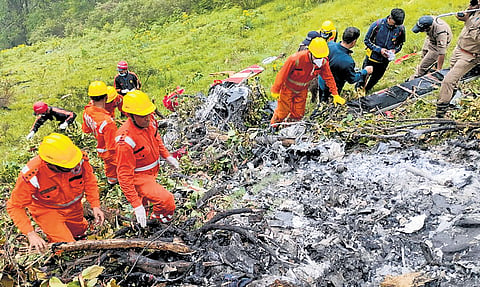 NDRF and SDRF personnel at the spot after a helicopter crashed near the Kedarnath shrine, in Rudraprayag district, Uttarakhand, on June 15.