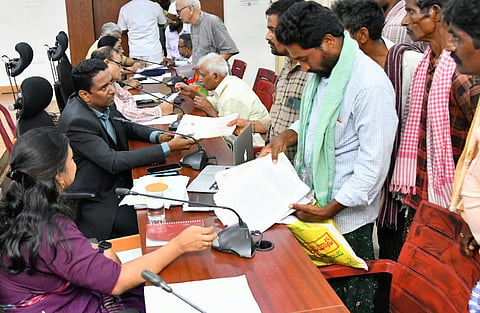 NTR district collector G Lakshmisha takes representations from the public during PGRS in Vijayawada on Monday.