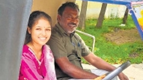 Adapa Spurthi and father Praveen drive their EV in Manuguru of Bhadradri Kothagudem district.