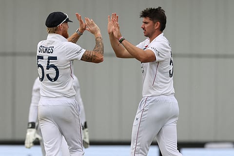 England bowler Josh Tongue and Skipper Ben Stokes collect four wickets each