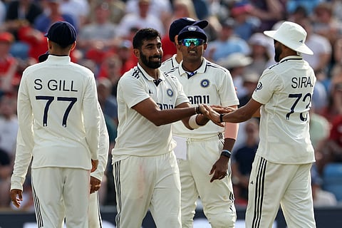 India's Jasprit Bumrah (C) celebrates with teammates after taking the wicket of England's Ben Duckett on day two of the first cricket test match between England and India in Leeds, northern England on June 21, 2025.