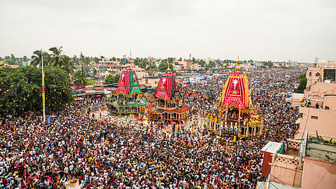 The volunteers formed a human chain, carving out a dedicated ambulance corridor through dense crowd, to provide prompt medical care during the chariot festival.