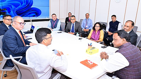 Chief Minister Mohan Charan Majhi with bank representatives.