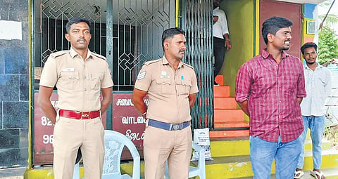 Cops standing guard at the home of key witness M Saktheeswaran.