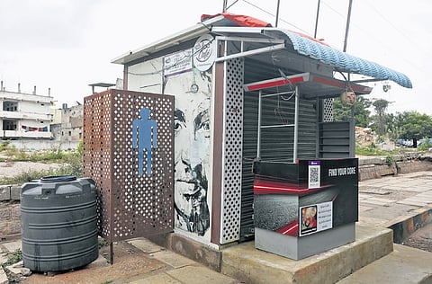 A view of a closed public toilet