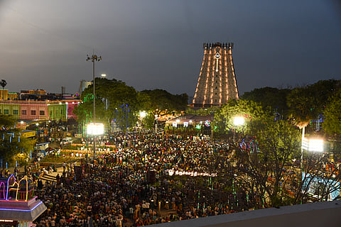 Massive crowd of devotees gathered at the Thiruparankundram Subramaniya Swamy temple to witness the grand Kumbabishekam ceremony.