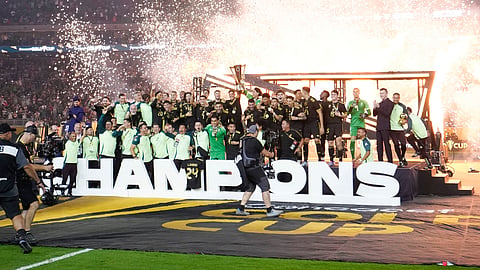 Mexico celebrates with the cup after beating the United States 2-1 on Sunday night for its record 10th CONCACAF Gold Cup title.