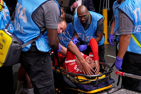 Bayern Munich's Jamal Musiala is taken off the field after an injury during the Club World Cup quarterfinal soccer match between PSG and Bayern Munich in Atlanta, Saturday, July 5, 2025.