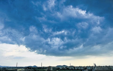 Dark clouds hover over Vijayawada on Thursday