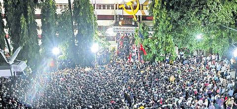 Thousands throng the AKG Centre in the state capital to get a final glimpse of V S Achuthanandan on Monday night